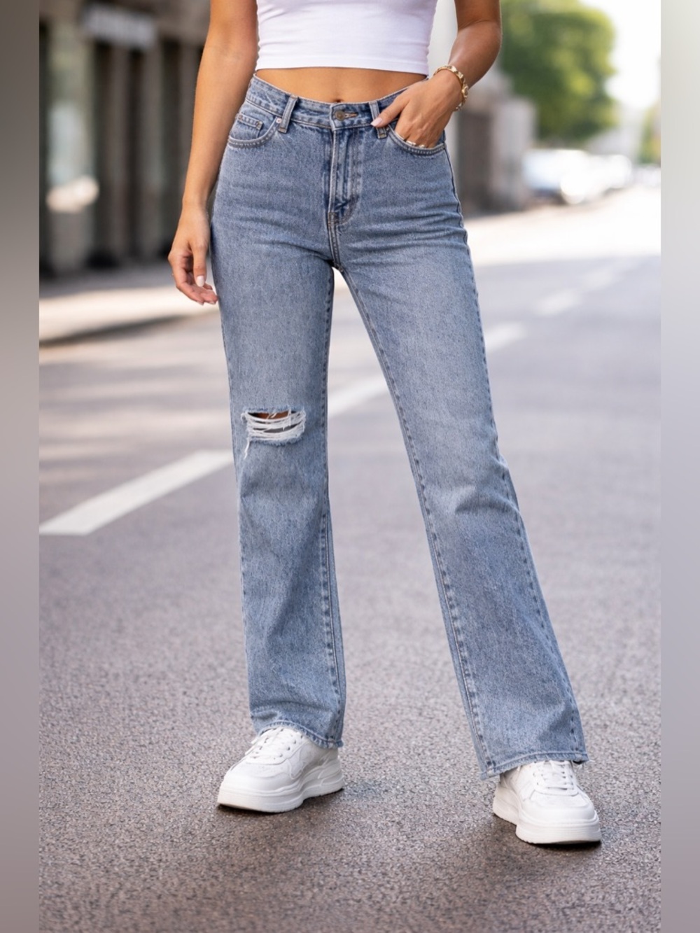 Express Women's Flare Jeans in Acid Wash Blue with Distressed Knee